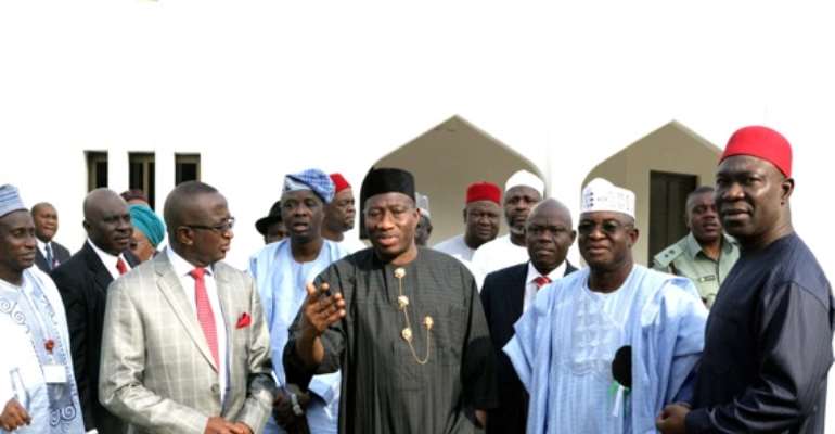 PRESIDENT GOODLUCK JONATHAN (M) WITH SENATE PRESIDENT DAVID MARK (2ND R), DEPUTY SENATE PRESIDENT IKE EKWEREMADU (R) AT THE PRESIDENTIAL VILLA FRIDAY JUST BEFORE THE MEETING WITH LABOUR LEADERS.