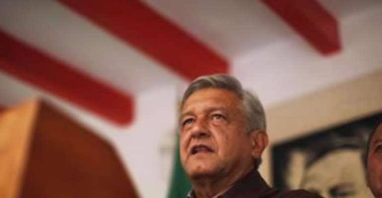 ANDRES MANUEL LOPEZ OBRADOR, PRESIDENTIAL CANDIDATE FOR THE PARTY OF THE DEMOCRATIC REVOLUTION (PRD), ATTENDS A NEWS CONFERENCE AT HIS CAMPAIGN HEADQUARTERS IN MEXICO CITY JULY 7, 2012.