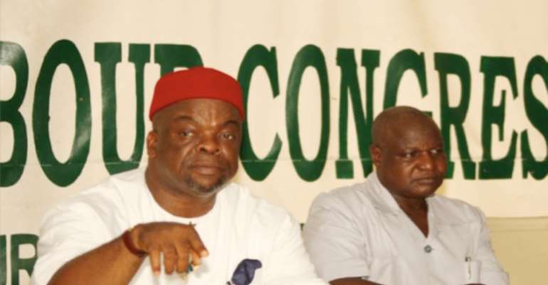L-R: LABOUR MINISTER, MR EMEKA WOGU AND NLC PRESIDENT, COMRADE ABDULWAHEED OMAR.