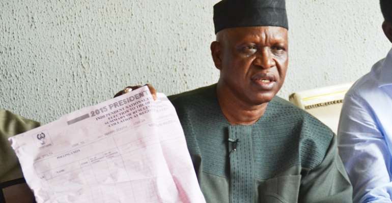 Olorogun Otega Emerhor Displays INEC Fake Election Result Sheet During A National Press Conference Immediately After The Elections In April