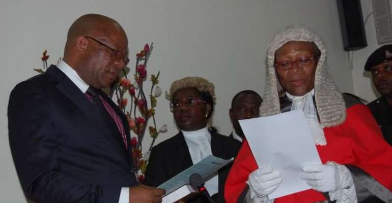 PHOTO: DELTA ACTING GOVERNOR, RT. HON. PRINCE SAM OBI DRUING HIS SWEARING IN.