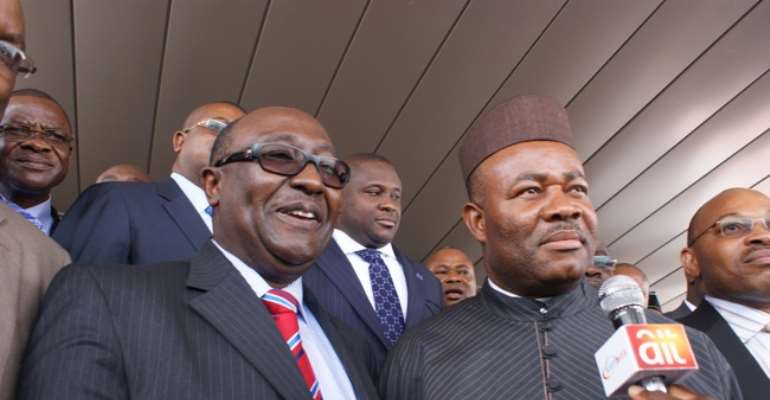 AKWA IBOM STATE GOVERNOR GODSWILL AKPABIO (R) WITH LEGAL COUNSEL CHIEF BAYO OJO SAN, AFTER THE TRIBUNAL VERDICT AFFIRMING AKPABIO AS GOVERNOR.