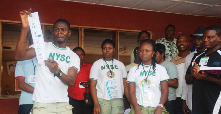 NYSC PERSONNEL DEPLOYED BY INEC DURING THE DELTA STATE GOVERNORSHIP RERUN ELECTION COUNT VOTES IN ASABA, STATE CAPITAL.
