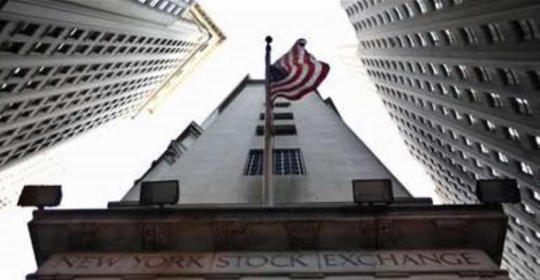 THE U.S. FLAG HANGS OUTSIDE THE NEW YORK STOCK EXCHANGE NOVEMBER 9, 2011.