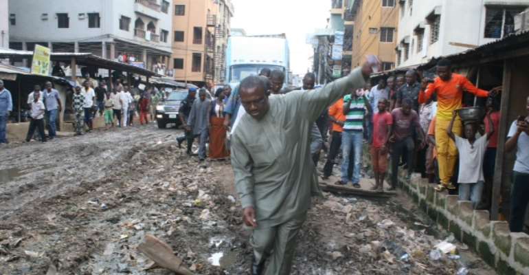 Gov. Peter Obi while inspecting Bida, Okwei and Moore Streets, Onitsha which he said was being designed for reconstruction.