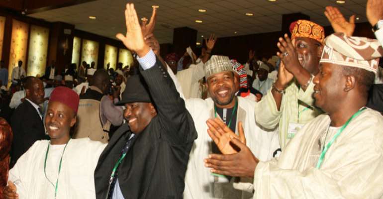 SPEAKER OF THE HOUSE, RT HON. AMINU WAZIRI TAMBUWAL (IN BLACK SUIT) AND DEPUTY SPEAKER HON. EMEKA IHEDIOHA (STANDING BEHIND TAMBUWAL) RAISE THEIR HANDS AFTER THEY WERE ELECTED LEADERS OF THE LOWER CHAMBER A FEW WEEKS AGO.