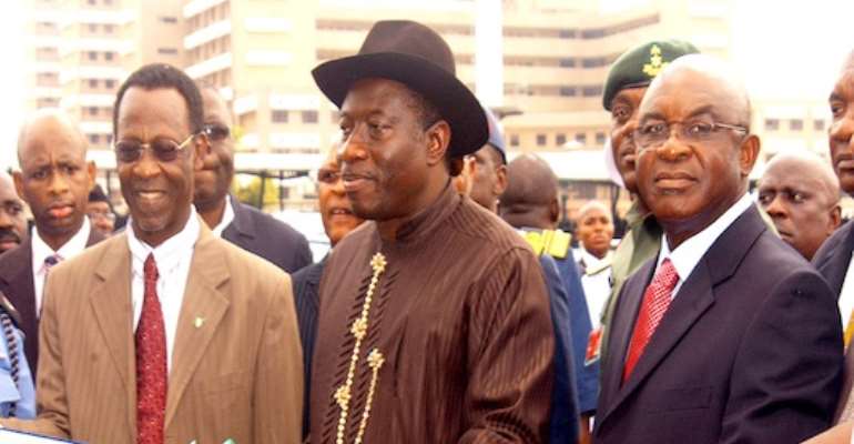 PHOTO: PRESIDENT GOODLUCK JONATHAN (MIDDLE) FLANKED BY SENATE PRESIDENT DAVID MARK (R) AND MINISTER OF POLICE AFFAIRS, HONOURABLE ADAMU WAZIRI AT THE COMMISSIONING OF A POLICE COMBAT HELICOPTER AND VEHICLES IN ABUJA TODAY, OCTOBER 18, 2010.