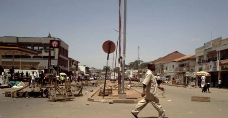 PHOTO: A DESERTED JOS STREET TODAY DURING THE CONFRONTATION BETWEEN OPERATIVES AND MOTORCYCLE RIDERS.