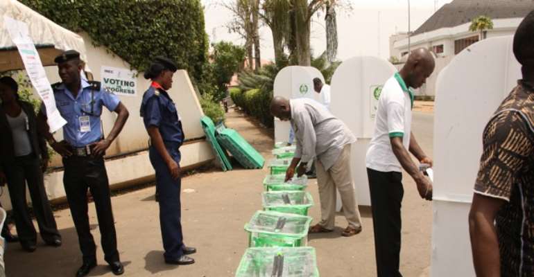 VOTING IN PROGRESS AT A POLLING UNIT IN ABUJA DURING THE PRESIDENTIAL ELECTION OF APRIL 16, 2011.