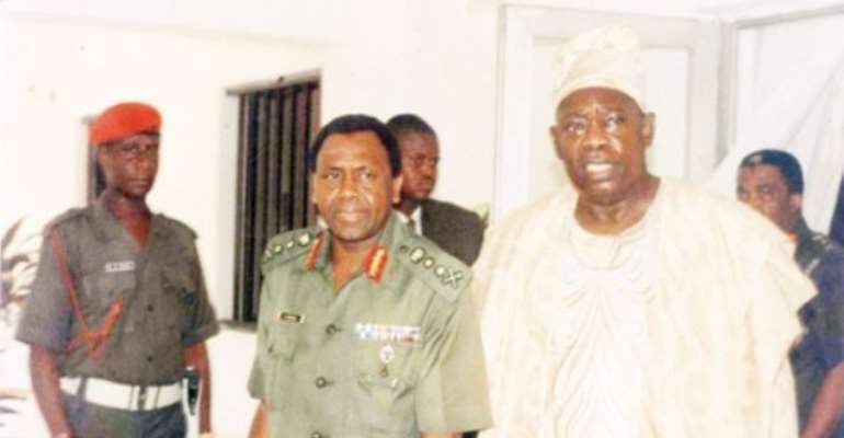 PHOTO: A FILE PHOTO OF LATE CHIEF MOSHOOD KASHIMAWO OLAWALE ABIOLA, M.K.O., (R) WITH LATE DICTATOR, GENERAL SANI ABACHA AT STATE HOUSE LAGOS A FEW DAYS AFTER ABACHA OUSTED ERNEST SHONEKAN AS INTERIM HEAD OF STATE.