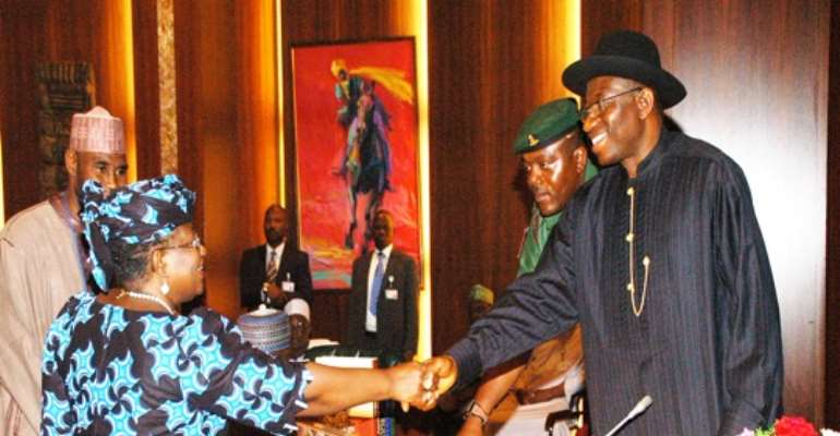 DR MRS NGOZI OKONJO-IWEALA IS CONGRATULATED BY PRESIDENT GOODLUCK EBELE JONATHAN AFTER HER SWEARING IN TODAY, AUGUST 17, 2011.