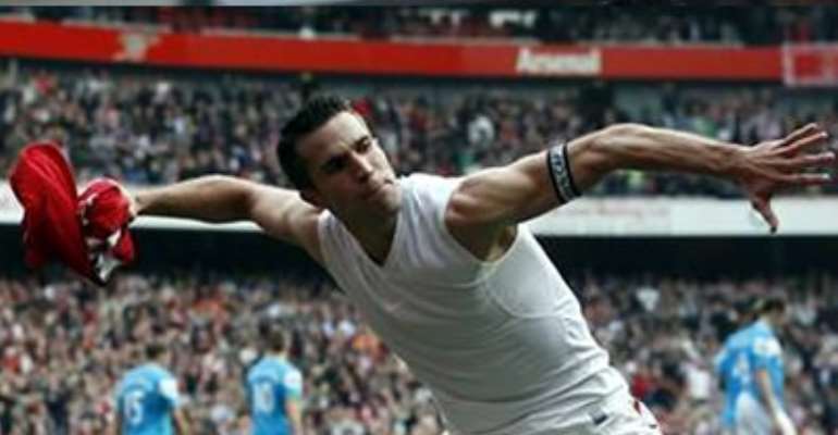 ARSENAL'S ROBIN VAN PERSIE CELEBRATES HIS SECOND GOAL AGAINST SUNDERLAND DURING THEIR ENGLISH PREMIER LEAGUE SOCCER MATCH AT THE EMIRATES STADIUM IN LONDON, OCTOBER 16, 2011.