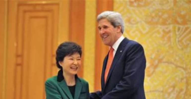 SOUTH KOREAN PRESIDENT PARK GEUN-HYE (L) AND U.S. SECRETARY OF STATE JOHN KERRY SHAKE HANDS BEFORE THEIR TALKS AT THE PRESIDENTIAL BLUE HOUSE IN SEOUL APRIL 12, 2013.