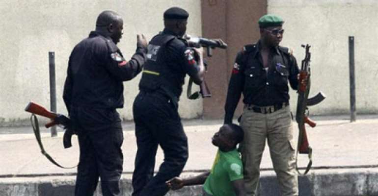 3 YET TO BE IDENTIFIED POLICEMEN MANHANDLING THE DECEASED BEFORE HE WAS FATALLY SHOT.