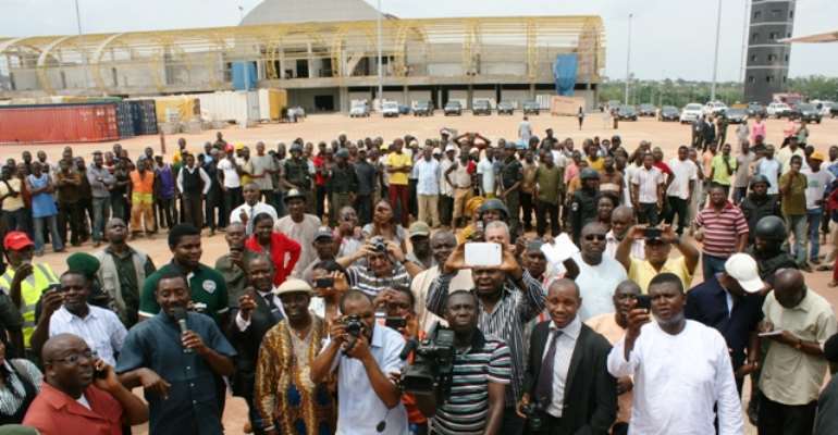 PHOTOGRAPHERS AND AIDES OF THE DELTA STATE GOVERNOR AT THE ASABA INTERNATIONAL AIRPORT DURING THE TEST RUN OF AVIATION EQUIPMENT AT THE AIRPORT.