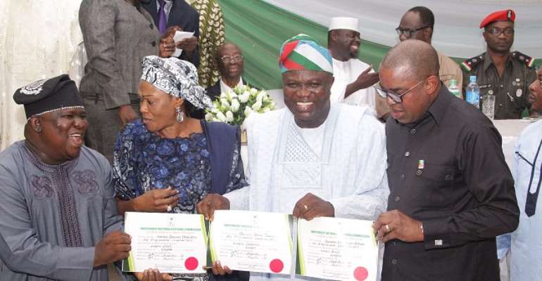 Senator Solomon Adeola, Senator Oluremi Tinubu, Governor Akinwunmi Ambode and Senator Gbenga Ashafa display their certificate of return received from INEC