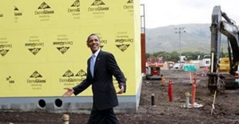 U.S. PRESIDENT BARACK OBAMA PASSES BY A CONSTRUCTION SITE AS HE TOURS SOLYNDRA, INC., A SOLAR PANEL MANUFACTURING FACILITY IN FREMONT, CALIFORNIA MAY 26, 2010.