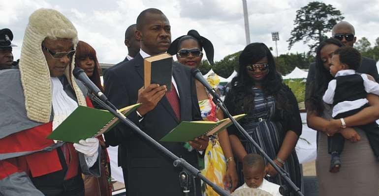 ENUGU STATE GOVERNOR, MR SULLIVAN CHIME TAKING HIS OATH OF OFFICE ON MAY 29, 2011 IN ENUGU.