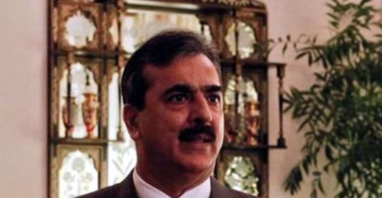 PAKISTAN'S PRIME MINISTER YUSUF RAZA GILANI SPEAKS DURING AN INTERVIEW WITH REUTERS AT HIS RESIDENCE IN ISLAMABAD SEPTEMBER 27, 2011.