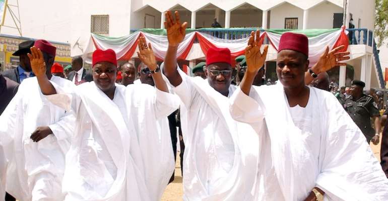 R-L: PDP KANO GOVERNORSHIP CANDIDATE RABIU KWAKWANSO, PRESIDENT GOODLUCK JONATHAN AND VICE PRESIDENT NAMADI SAMBO AT A PRESIDENTIAL RALLY IN KANO STATE TODAY, MARCH 16, 2011.