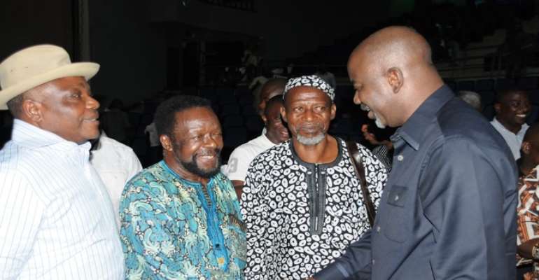 PHOTO: CROSS RIVER STATE GOVERNOR, SENATOR LIYEL IMOKE (R) EXCHANGES PLEASANTRIES WITH MR. LARRY WILIAMS (M), WHILE MR ODIA OFEIMUN WATCHES, SHORTLY AFTER THE DRAMA PRESENTATION AT THE MAIN BOWL OF THE CULTURAL CENTRE IN CALABAR AT THE WEEKEND.