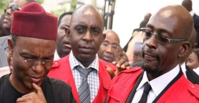 PHOTO: NASIR el-RUFAI (L) WITH OPERATIVES OF THE EFCC.