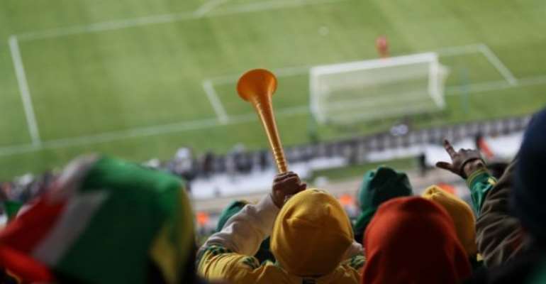 PHOTO: A FAN BLOWS A VUVUZELA DURING A GROUP A WORLD CUP SOCCER MATCH BETWEEN SOUTH AFRICA AND MEXICO ON JUNE 11, 2010., Image: VALERY HACHE/AFP/GETTY IMAGES.