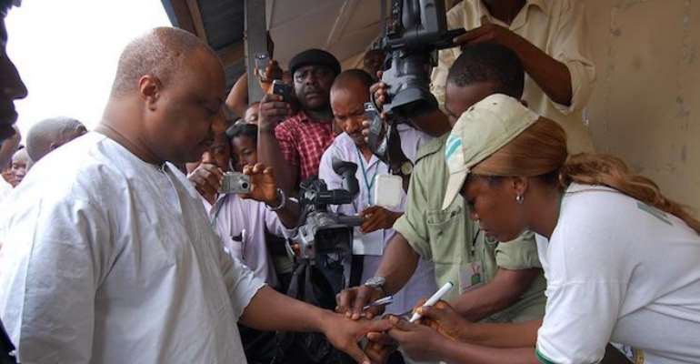 CHIEF GREAT OVADJE OGBORU VOTING DURING THE DELTA STATE GOVERNORSHIP RERUN ELECTION IN JANUARY 2011.