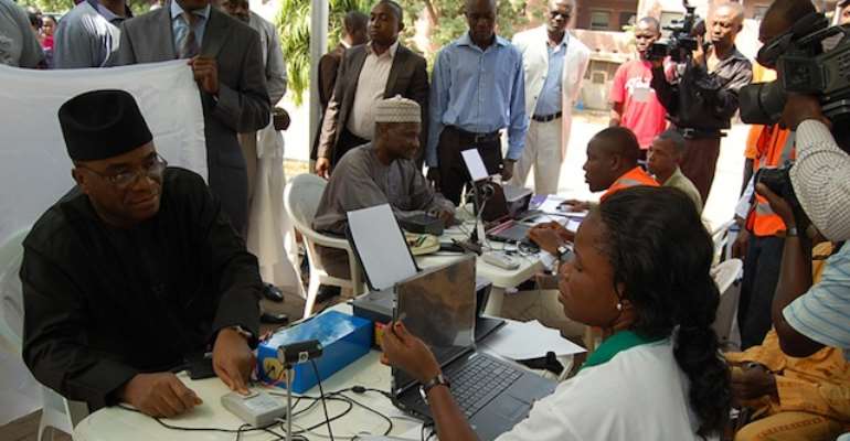 CHIEF OF NAVAL STAFF, VICE ADMIRAL OLA SA'AD IBRAHIM REGISTERS TO VOTE AT A REGISTRATION CENTRE IN ABUJA.