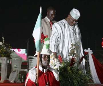 FORMER NIGERIAN VICE-PRESIDENT ATIKU ABUBAKAR (R) AND PRESIDENTIAL ASPIRANT LEAVES THE PODIUM AFTER ADDRESSING DELEGATES