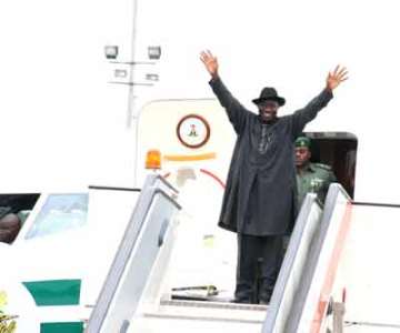 President Goodluck Jonathan acknowledging cheers from the crowd yesterday.