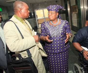 Minister of Finance, Dr. Ngozi Okonjo-Iweala,(m) SEC-Gen JONAPWD, Mr. Dandison Nwankpa Hart and Media Consultant- National President Joint National Association of persons with disabilities (JONAPWD), Mr. Chike Okogwu during a courtesy visit to the Coordinating Minister of the Economic Team yesterday in Abuja.