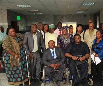 Minister of Finance, Dr. Ngozi Okonjo-Iweala (M), National President Joint National Association of persons with disabilities (JONAPWD), Barrister Danlami Bashir, SEC-Gen JONAPWD, Mr. Dandison Nwankpa Hart and Media Consultant, National President Joint National Association of persons with disabilities (JONAPWD), Mr. Chike Okgwu and others members during a courtesy visit to the Coordinating Minister of the Economic Team yesterday in Abuja. PHOTO; SUNDAY AGHAEZE.
