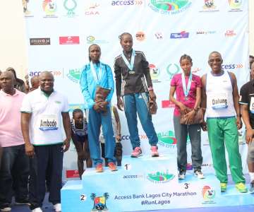 GOV. AMBODE, HON. DALUNG, HERBERT WIGWE AND THE  TOP FEMALE ATHLETES OF THE MARATHON
