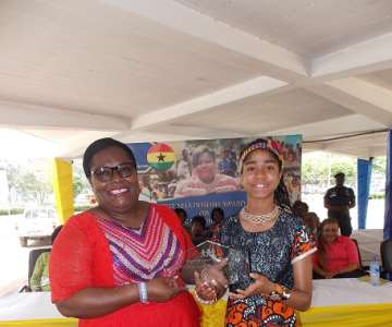 ZURIEL PRESENTS AWARD TO MINISTER MARCH 24