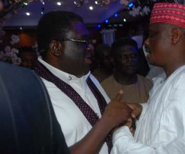 Their Excellencies, Governor Kwankwaso of Kano State with Imo Deputy Governor exchanging pleasantries at the Wedding Ceremony of Imo State Governor, Owelle Rochas Okorocha''s  second daughters wedding in Imo State International Convention Centre, Owerri last Saturday