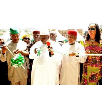 Speaker  House of Reps. Waziri Tambuwal cutting the tape to commission the new Abia state Environmental Protection Agency (ASEPA) Permanent head office in Umuahia, with him from 1st right are Gov. Theodore Orji of Abia state, Member representing Umunochi federal constituency Hon. Nkiruka Onyejiocha and G/M, ASEPA, Hon. Ikechukwu Apugo and on his left Rt. Hon. Emeka Ihedioha, Deputy Speaker, House of Reps.