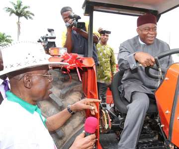 Gov. Theodore Orji of Abia state test driving one of the tractors he donated to farmers in state at government house Umuahia.