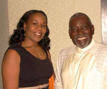 OLU JACOBS AND A GUEST