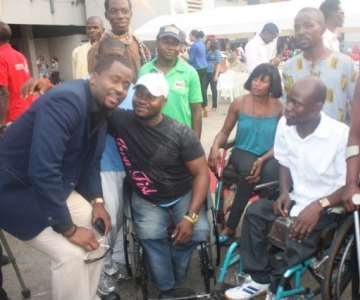 Desmond Elliot with the physically challenged sport men