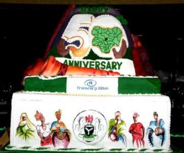 NIGERIA'S 50TH INDEPENDENCE ANNIVERSARY CAKE being CUT BY PRESIDENT GOODLUCK JONATHAN TODAY FRIDAY IN ABUJA.<br/>