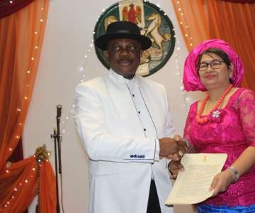 His Excellency Governor Willie Obiano and Leader of the Thai Delegation, Dr. Ratana Porn exchanging copies of the signed Communique during the Cultural Night held at Governors Lodge Amawbia.