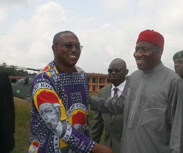 President Goodluck Jonathan , GCFR (right) being welcome by Gov. Obi (left), at the helipad at Ogidi for the  burial service for Prof. Chinua Achebe at St. Philips Anglican Church, Ogidi, Anambra State, today
