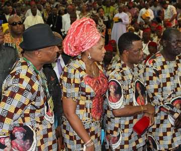 (L-R) Dr. Nkem Okeke, Deputy Governor of Anambra State, Chief Mrs Ebelechukwu Obiano, wife of the governor, Chief Willie Obiano, Governor of Anambra State and Dr. Chke Akunyili, widower of Prof Dora Akunyili awaiting the arrival of the body of the late Minister of Information at the Women Development Center, venue of the Honours & Tributes...Wednesday