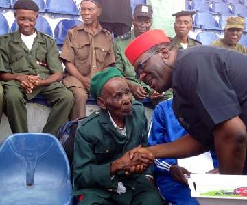His Excellency, Deputy Governor of Imo State, Prince Eze Madumere, MFR, humbly honouring and having a warm handshake with Nigeria''s Oldest Burma Soldier hero who is 115 years during the kick-Starting of Armed Forces and Remembrance Day with the Emblem Appeal Fund Launching at Heroes Square earlier today in Imo State