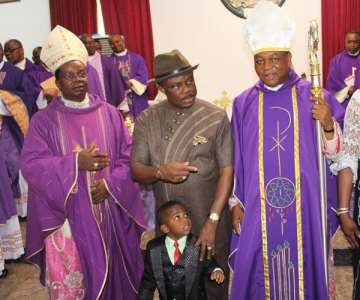 Pix 1(L-R): Catholic Bishop of Awka, His Lordship Most Rev. Paulinus Ezeokafor, Anambra State Governor, Chief Willie Obiano and his son Difu, Catholic Archbishop Bishop of Abuja, John Cardinal Onaiyekan, and wife of the Anambra State Governor, Chief (Mrs.) Ebelechukwu Obiano at the Pontifical Mass to commemorate one-year €“in office at the Governor''s Lodge, Amawbia…Sunday