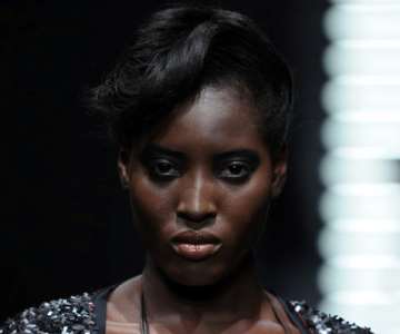 The photos has the tall black beauty!<br/> Her name is Bunmi Ademokoya from Ilesa, Osun State.