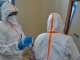 WHO Health workers prepare for work at a newly-opened Ebola treatment centre in Bunia, DR Congo