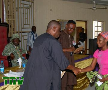 A BENEFICIARY RECIEVING HER AWARD LETTER