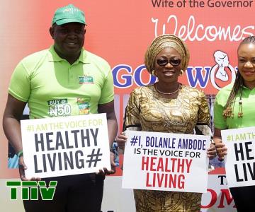 Pix 6623: Wife of the Governor of Lagos State and convener, Lagos Women Forum, Mrs. Bolanle Ambode (m); and reps. of Power Oil, Mrs. Omotayo Abiodun  (r) and Opeyemi Awojobi (L), with placards bearing the message: ‘Be the Voice for Healthy living…”, during the forum, with the theme: ‘Woman…Your Health, Your Social Environment’, held at the Police College, GRA, Ikeja, on Tuesday, 19th June 2018.<br/><br/>